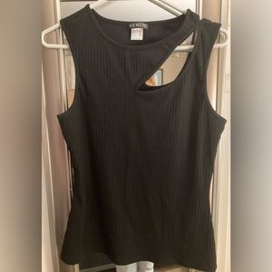 Black cut out sleeveless top. Never worn. Size Medium. Perfect condition